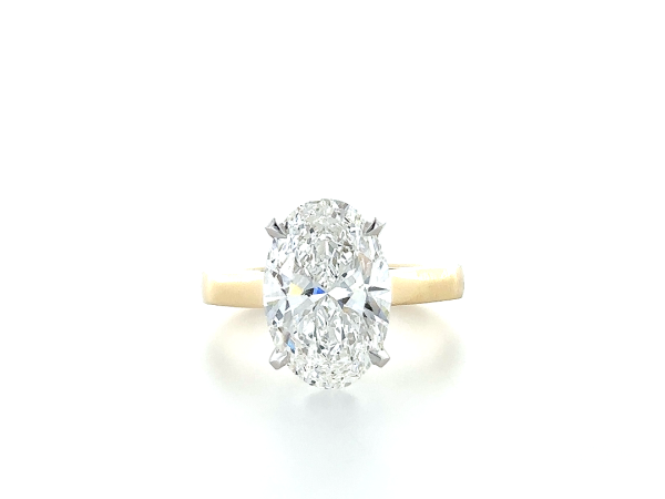 Oval studded solitaire ring