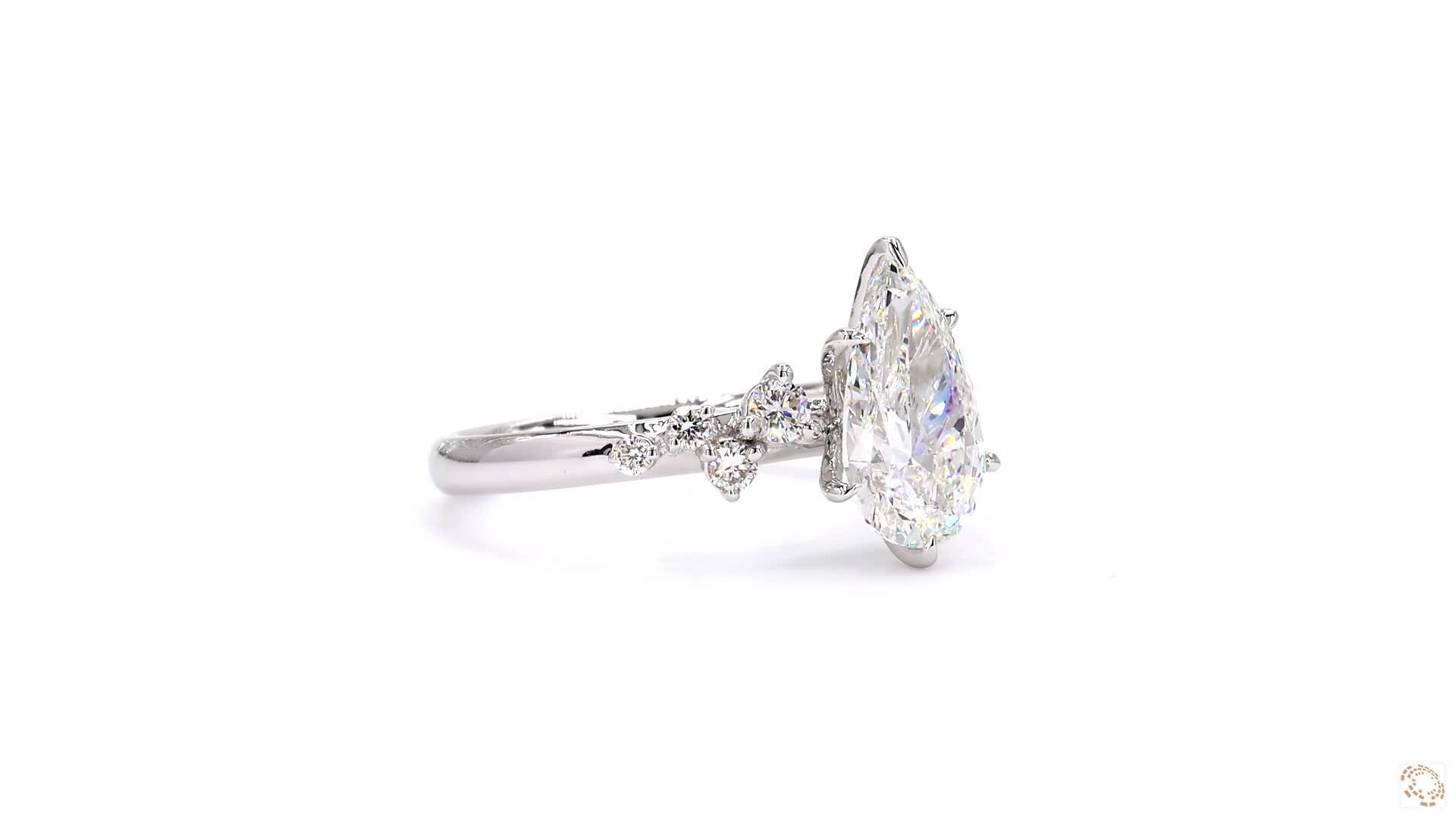 Pear cut ring with diamond studded pave band - Image 2