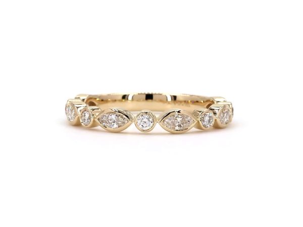 Stylish ring with Marquise and Round diamonds in Bezel setting