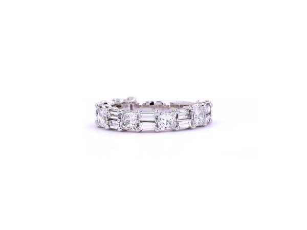 Exquisite princess and baguette studded eternity band