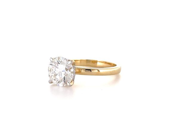 Contemporary Round cut diamond ring with hidden halo
