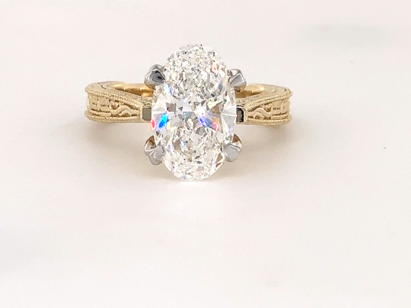 Oval cut solitaire filigree ring