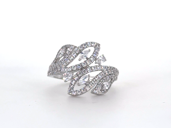 Flower ring designed with Marquise Pear and Round diamond