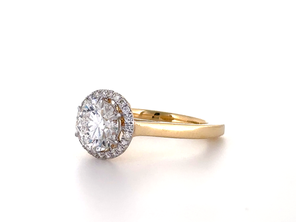 Round cut diamond ring with Halo
